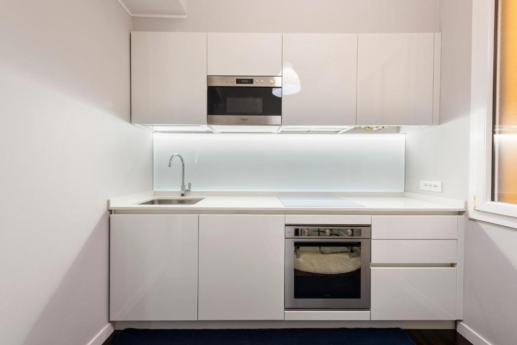 Kuchnia lub aneks kuchenny w obiekcie Ponte Vecchio Deluxe Apartments