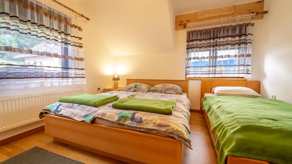 Posteľ alebo postele v izbe v ubytovaní Apartman Suhi vrh
