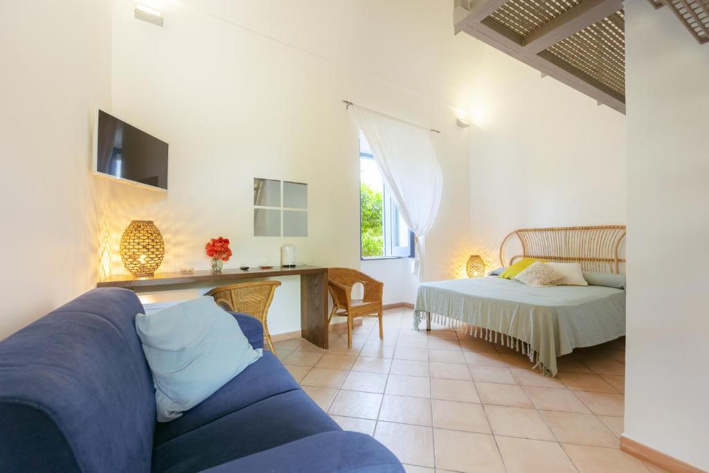 Postel nebo postele na pokoji v ubytování Casa Giovanni da Procida