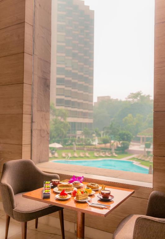 Bazén v ubytování Hyatt Regency Delhi nebo v jeho okolí