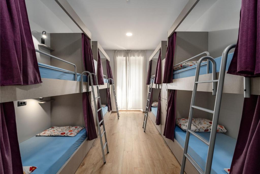 Postel nebo postele na pokoji v ubytování Hostel Antique