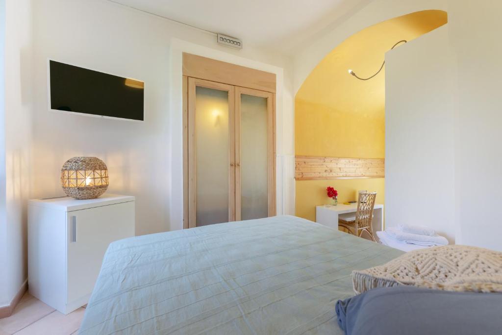 Postel nebo postele na pokoji v ubytování Casa Giovanni da Procida