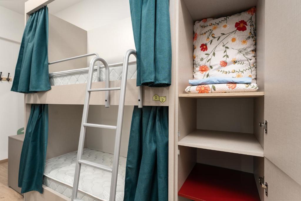 Postel nebo postele na pokoji v ubytování Hostel Antique