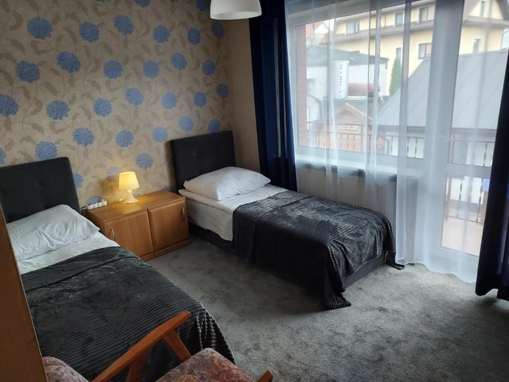 Postel nebo postele na pokoji v ubytování Prestige 2