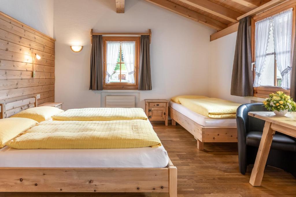 Postel nebo postele na pokoji v ubytování Hotel Landgasthof Staila