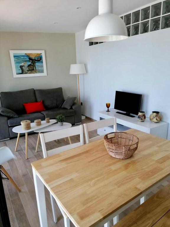 TV a/nebo společenská místnost v ubytování Apartamento frente al mar