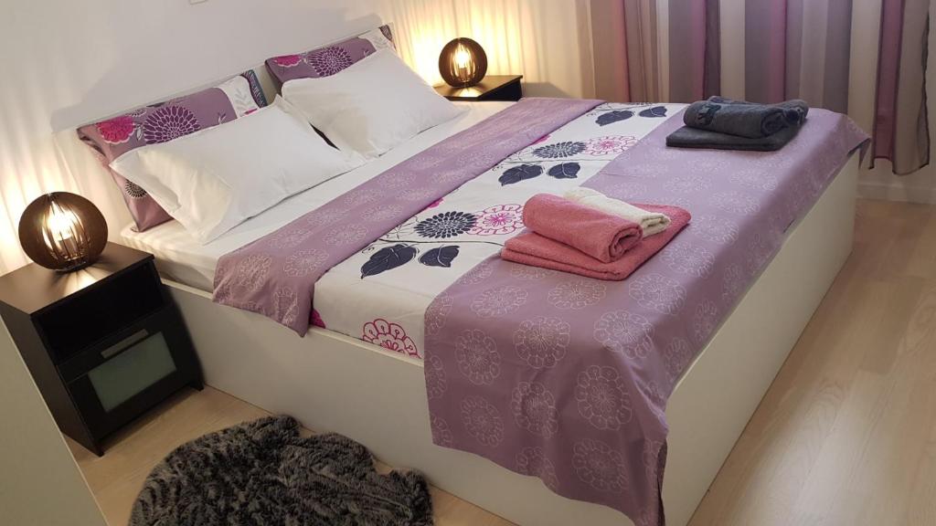 Postel nebo postele na pokoji v ubytování Apartment Verdi Split