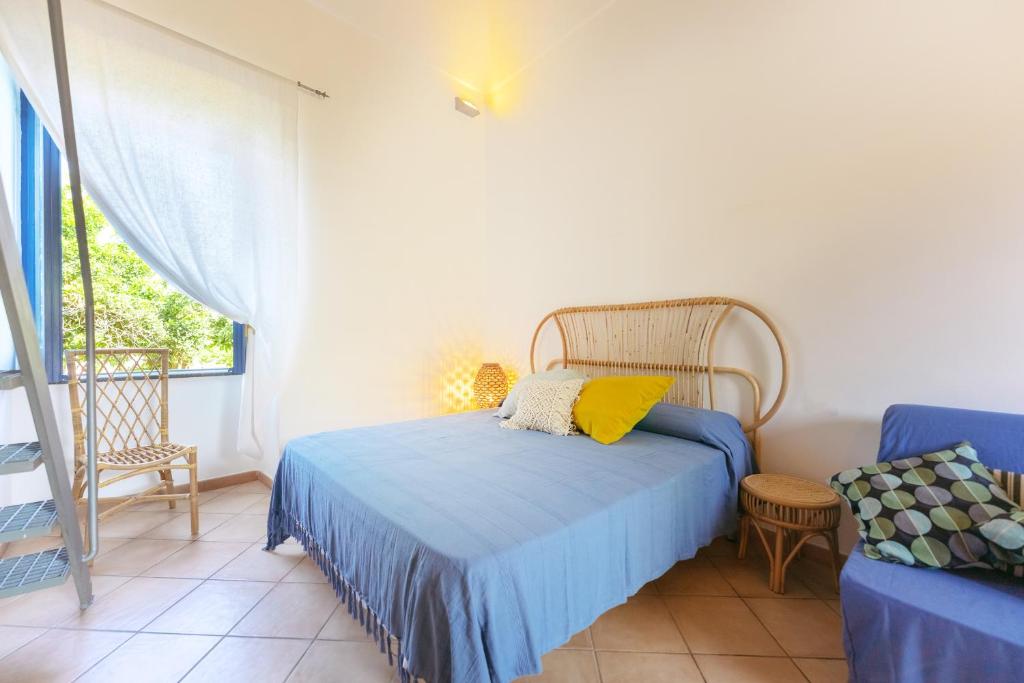 Postel nebo postele na pokoji v ubytování Casa Giovanni da Procida