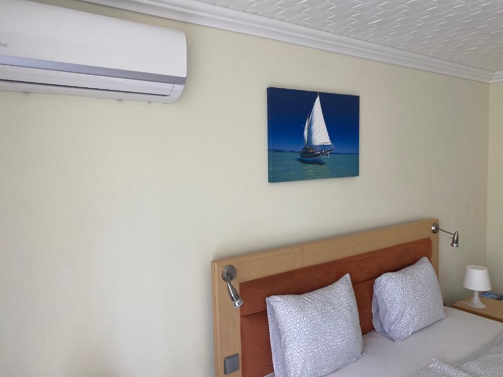 Postel nebo postele na pokoji v ubytování Solaris Hotel