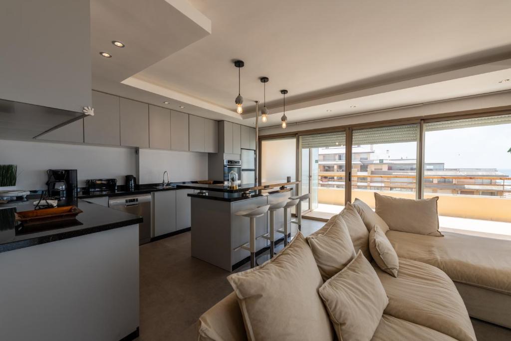 Kuchyň nebo kuchyňský kout v ubytování Appartement 300m2 vue sur océan Prestigia - Plage des nations