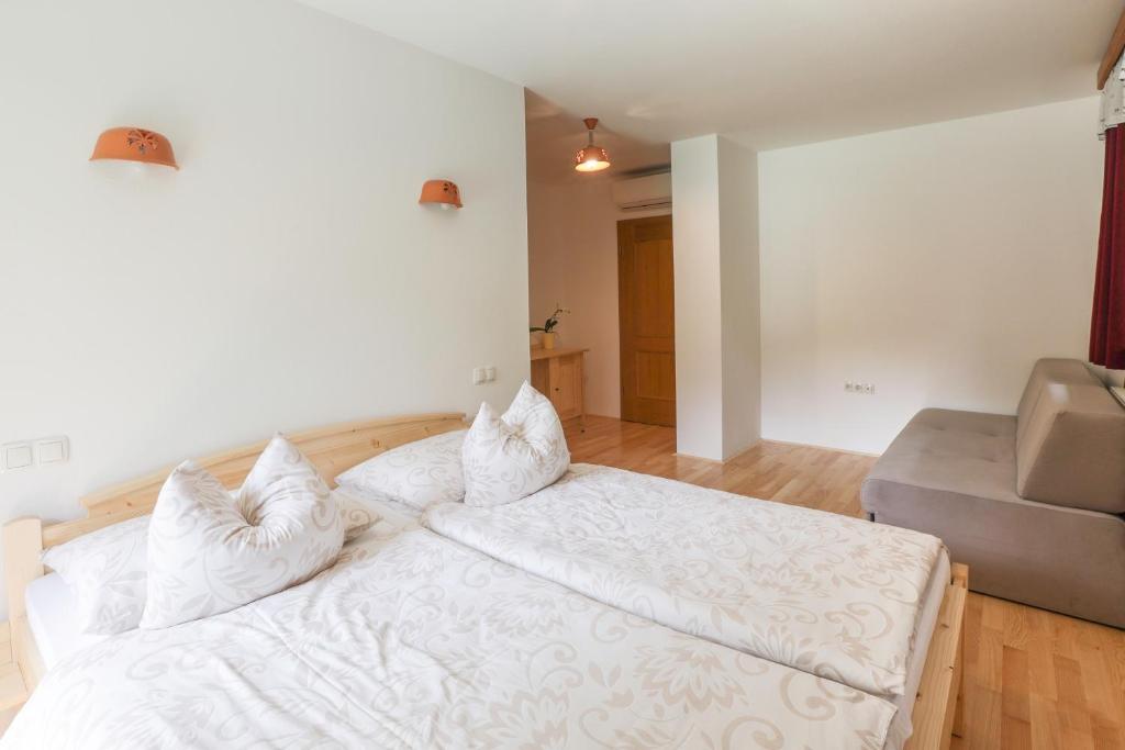 Postel nebo postele na pokoji v ubytování Tourist farm Mulej