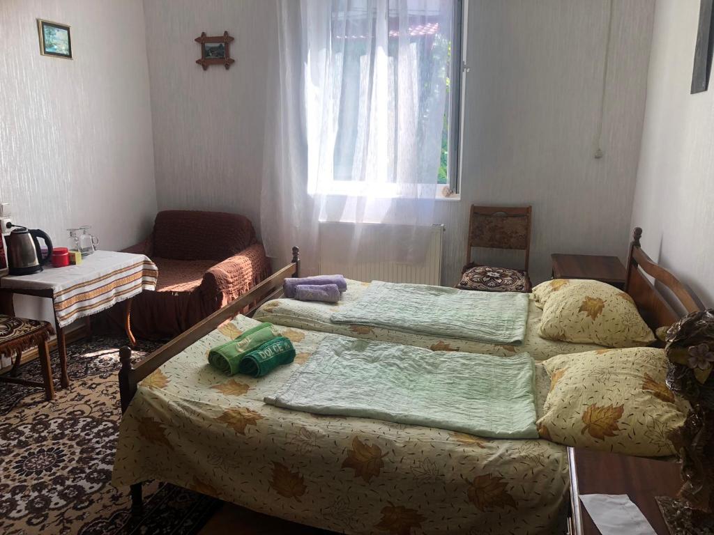 Postel nebo postele na pokoji v ubytování Rimma Homestay
