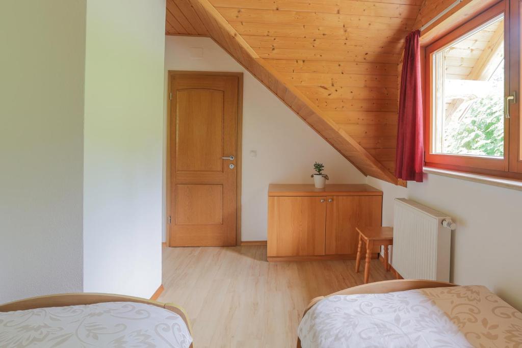 Postel nebo postele na pokoji v ubytování Tourist farm Mulej