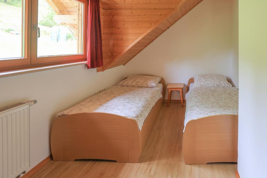 Postel nebo postele na pokoji v ubytování Tourist farm Mulej