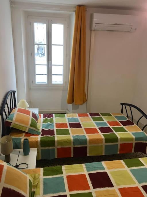 Posteľ alebo postele v izbe v ubytovaní Agréable maison au cœur du village