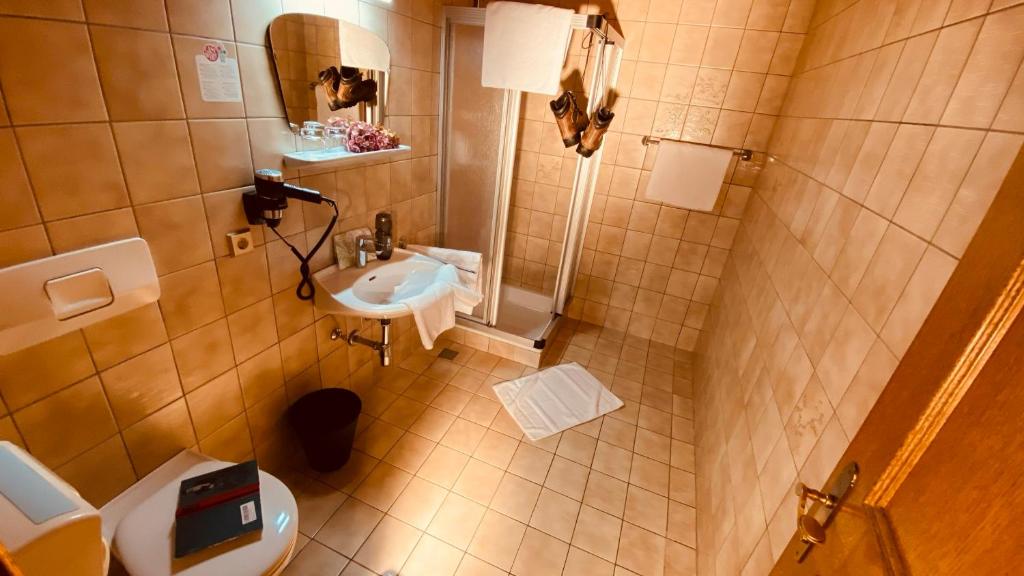 Kúpeľňa v ubytovaní Hotel Standlhof Zillertal