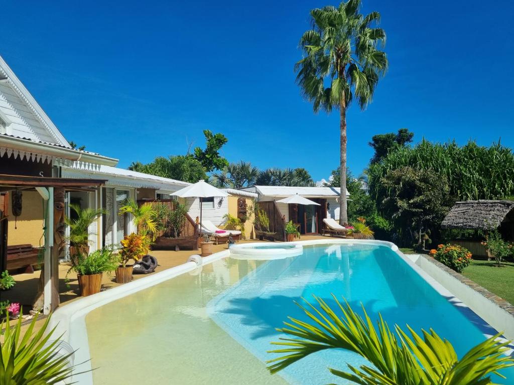 an image of a swimming pool in a house at Villa Tonga Soa in Ambaro