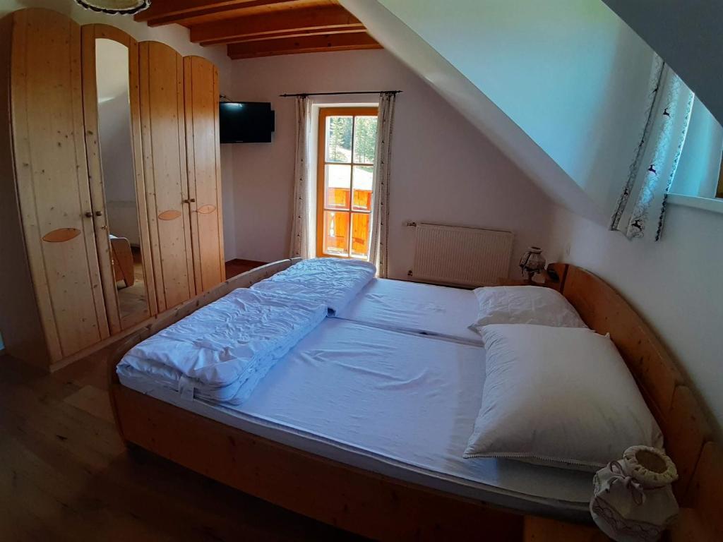 Posteľ alebo postele v izbe v ubytovaní Lachtalhütte
