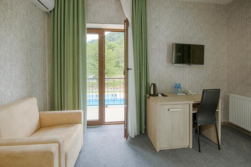 TV a/nebo společenská místnost v ubytování Sviana Resort