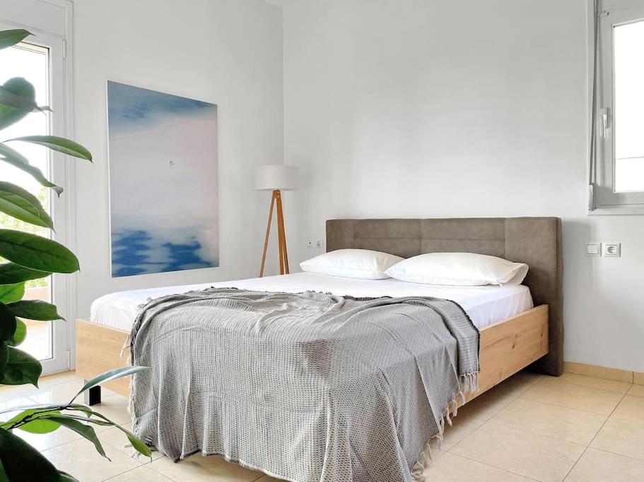 A bed or beds in a room at FLAT 45