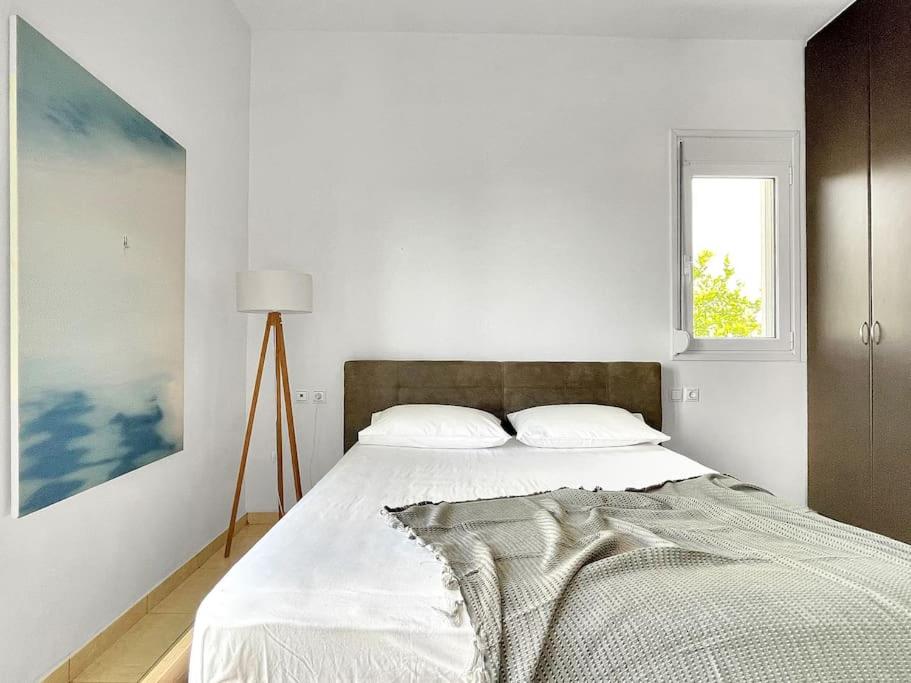 A bed or beds in a room at FLAT 45