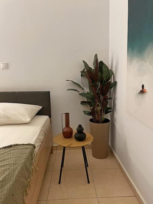 A bed or beds in a room at FLAT 45
