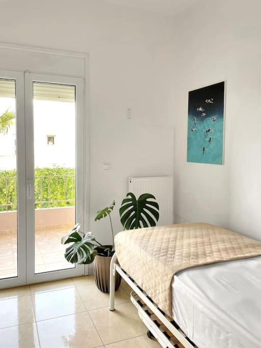 A bed or beds in a room at FLAT 45
