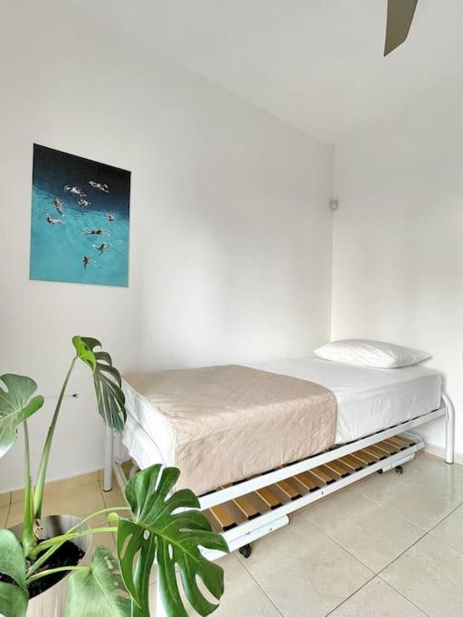 A bed or beds in a room at FLAT 45