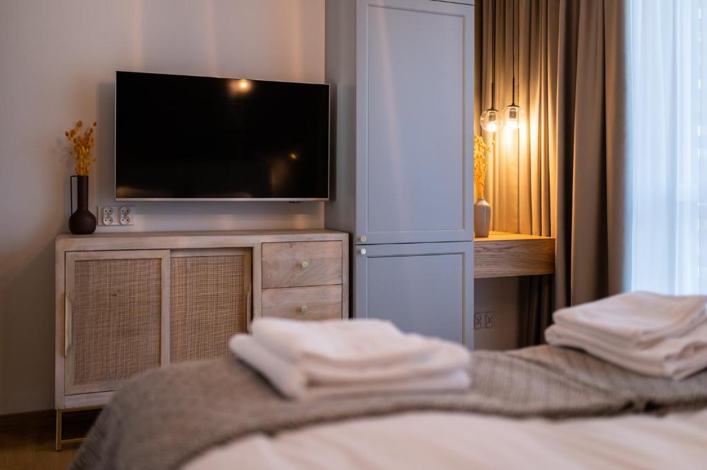 Posteľ alebo postele v izbe v ubytovaní WILANESKA Apartament Olimpijska Szczyrk