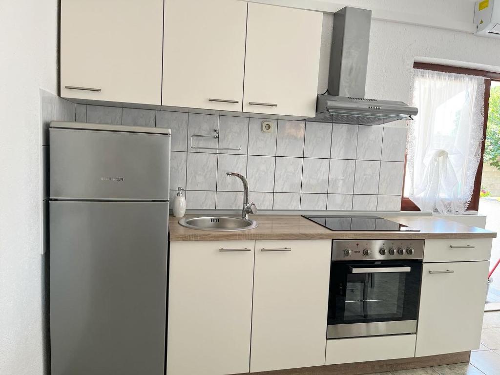 Kuchnia lub aneks kuchenny w obiekcie Apartments Fortuna