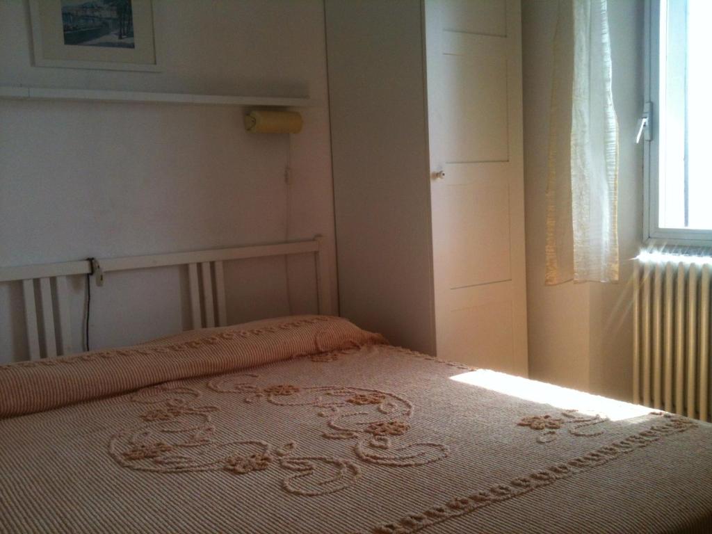 Postel nebo postele na pokoji v ubytování Casa Logo