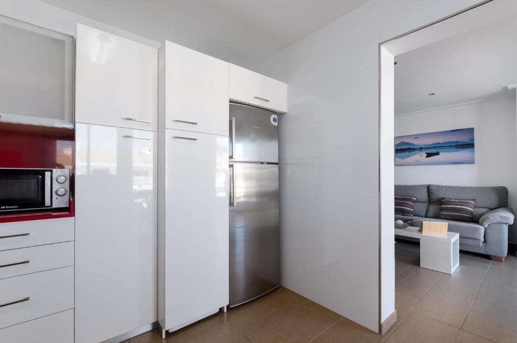 Kuchyň nebo kuchyňský kout v ubytování YourHouse Estel