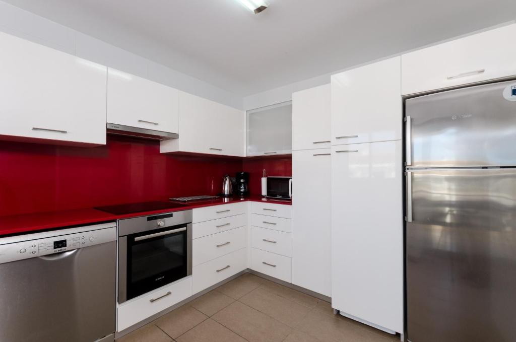Kuchyň nebo kuchyňský kout v ubytování YourHouse Estel