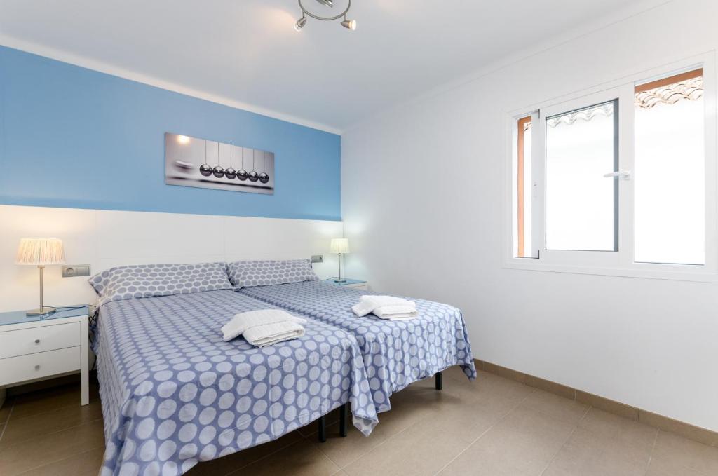 Postel nebo postele na pokoji v ubytování YourHouse Estel