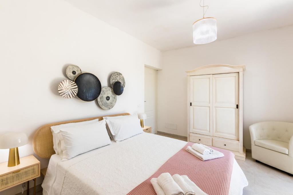 Postel nebo postele na pokoji v ubytování Panarea 22
