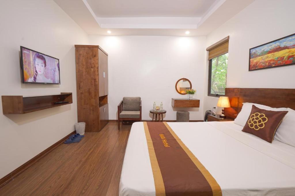 Postel nebo postele na pokoji v ubytování B & B Hotel Quan Hoa