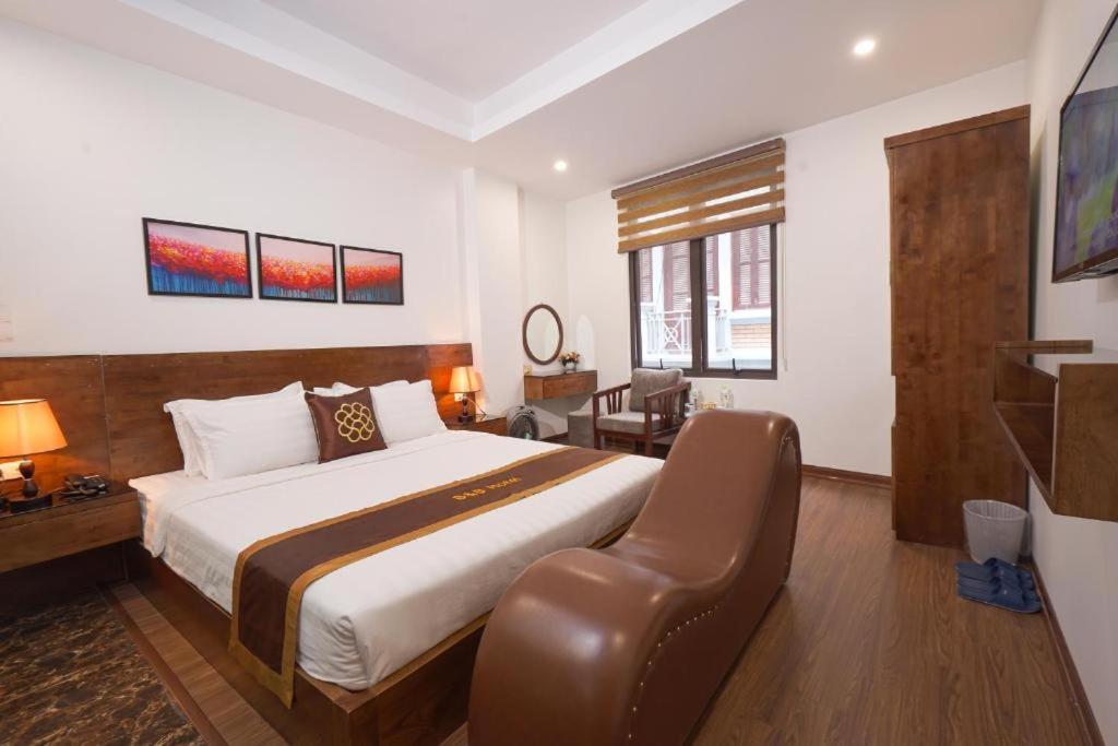 Postel nebo postele na pokoji v ubytování B & B Hotel Quan Hoa