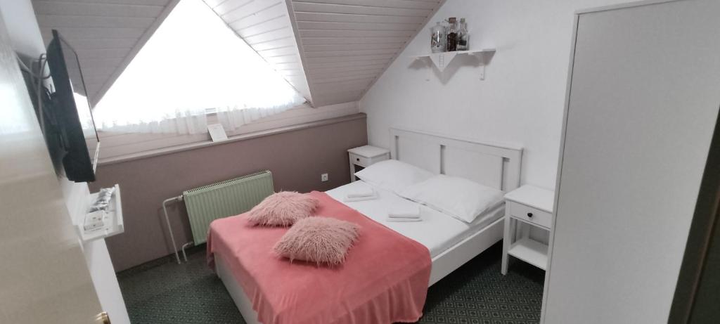 Postel nebo postele na pokoji v ubytování Penzion Park