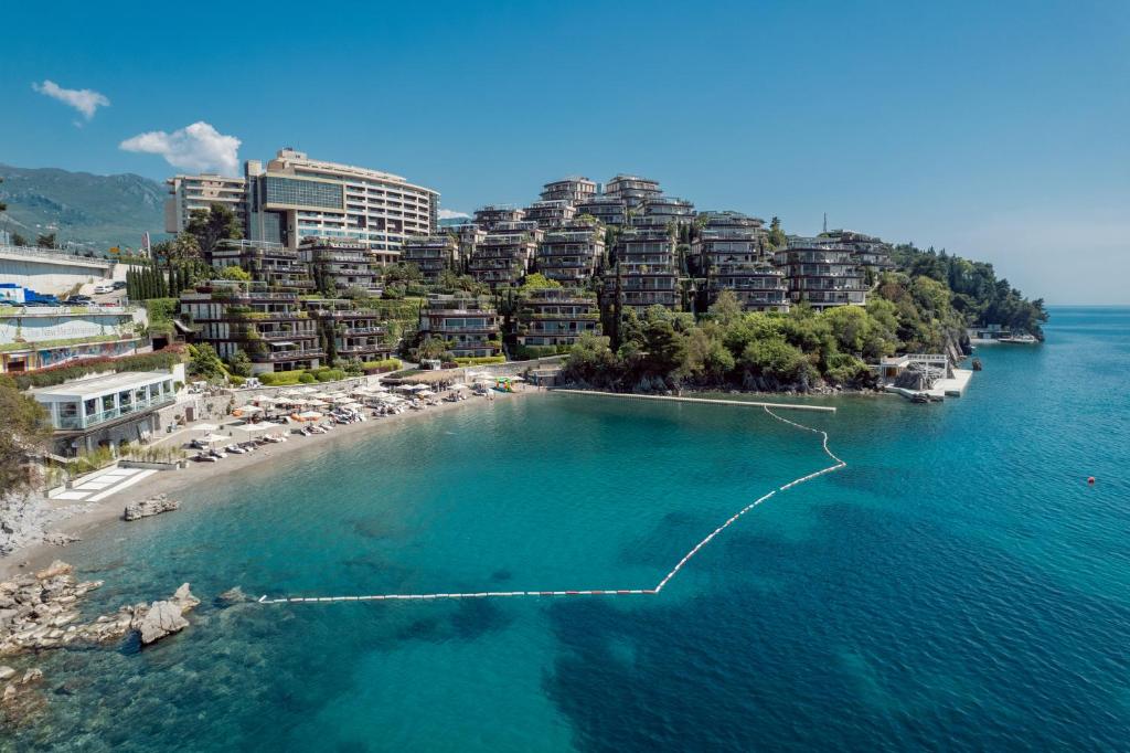 an aerial view of a beach with hotels and condos at Dukley Hotel & Resort in Budva