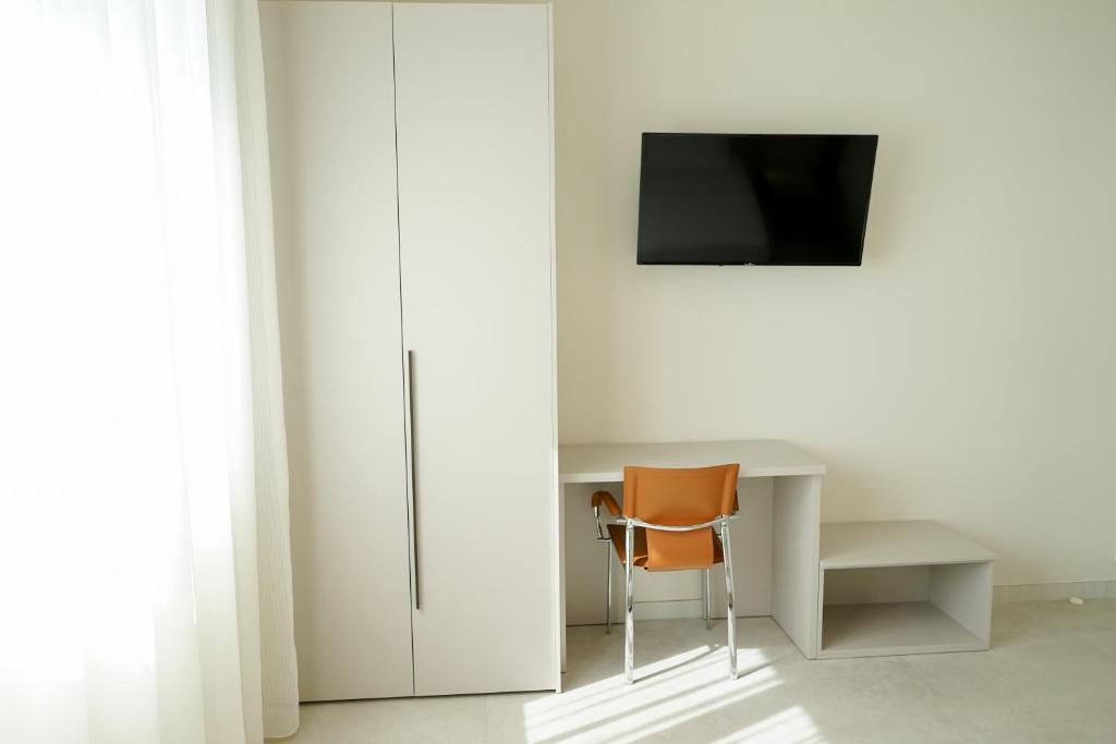 TV a/nebo společenská místnost v ubytování Ferrocino Resort