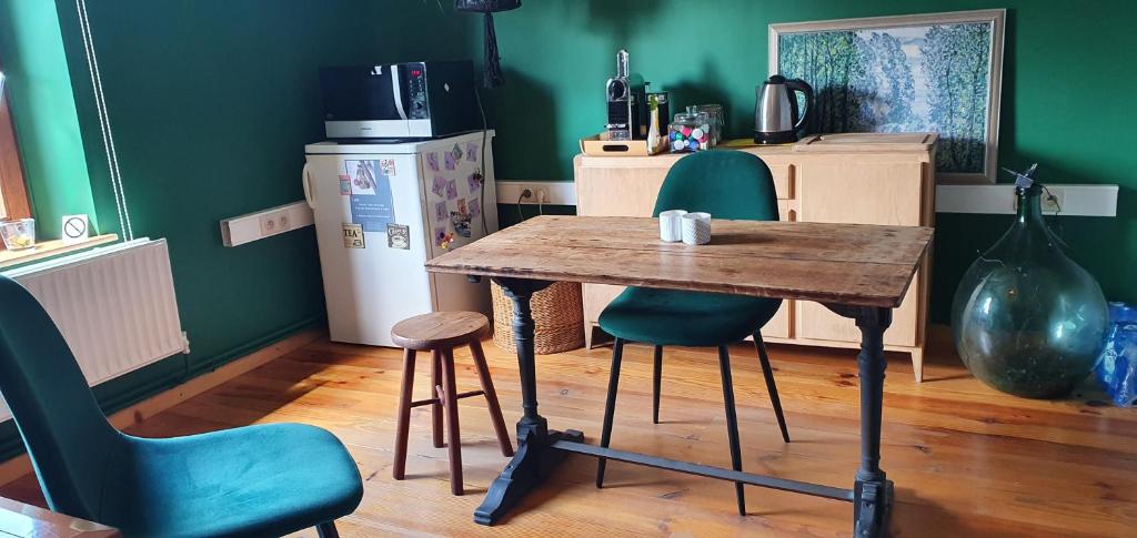 Kuchyň nebo kuchyňský kout v ubytování Chambre d'Amandine