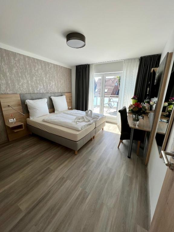 Postel nebo postele na pokoji v ubytování Hotel Ocean