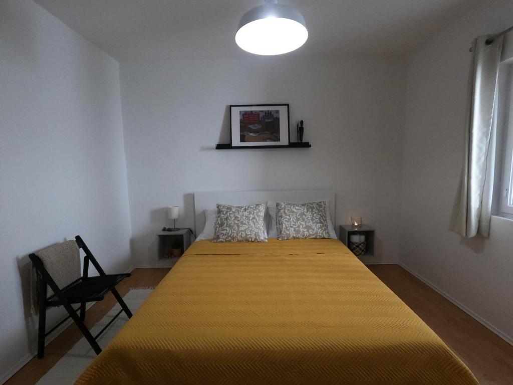 Postel nebo postele na pokoji v ubytování Moj komod