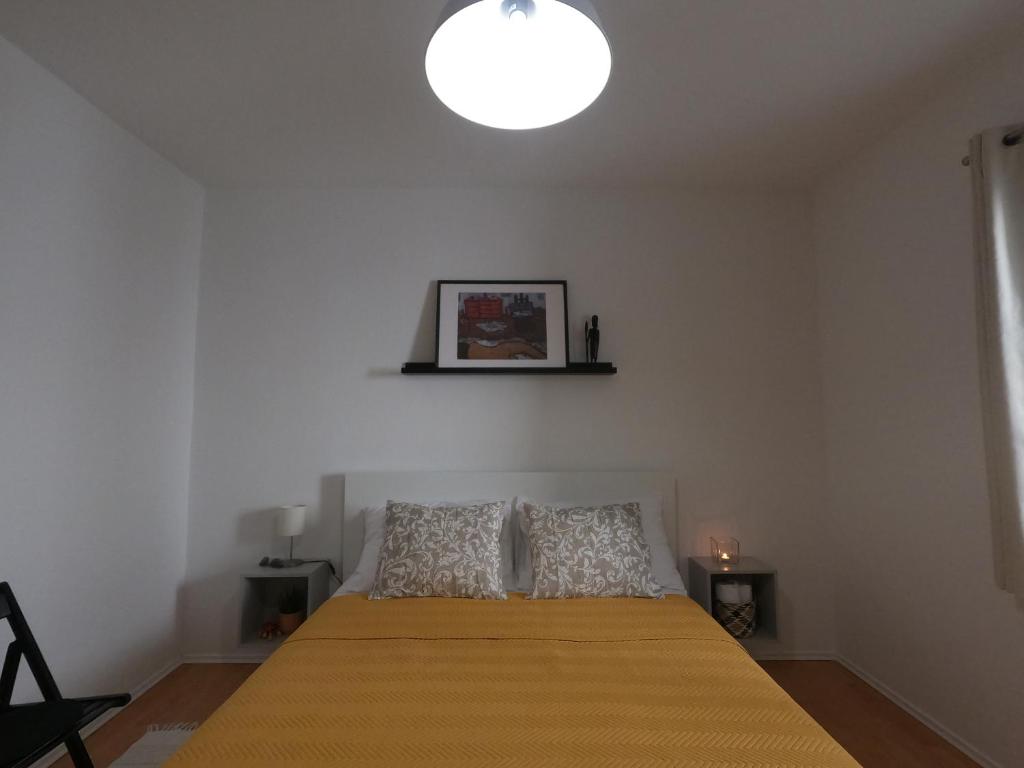 Postel nebo postele na pokoji v ubytování Moj komod