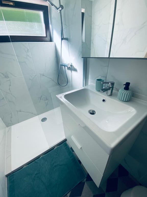 Koupelna v ubytování Apartma KAMNITNK