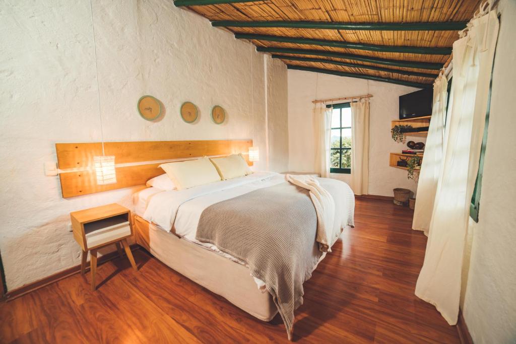 Postel nebo postele na pokoji v ubytování Estancia San Antonio