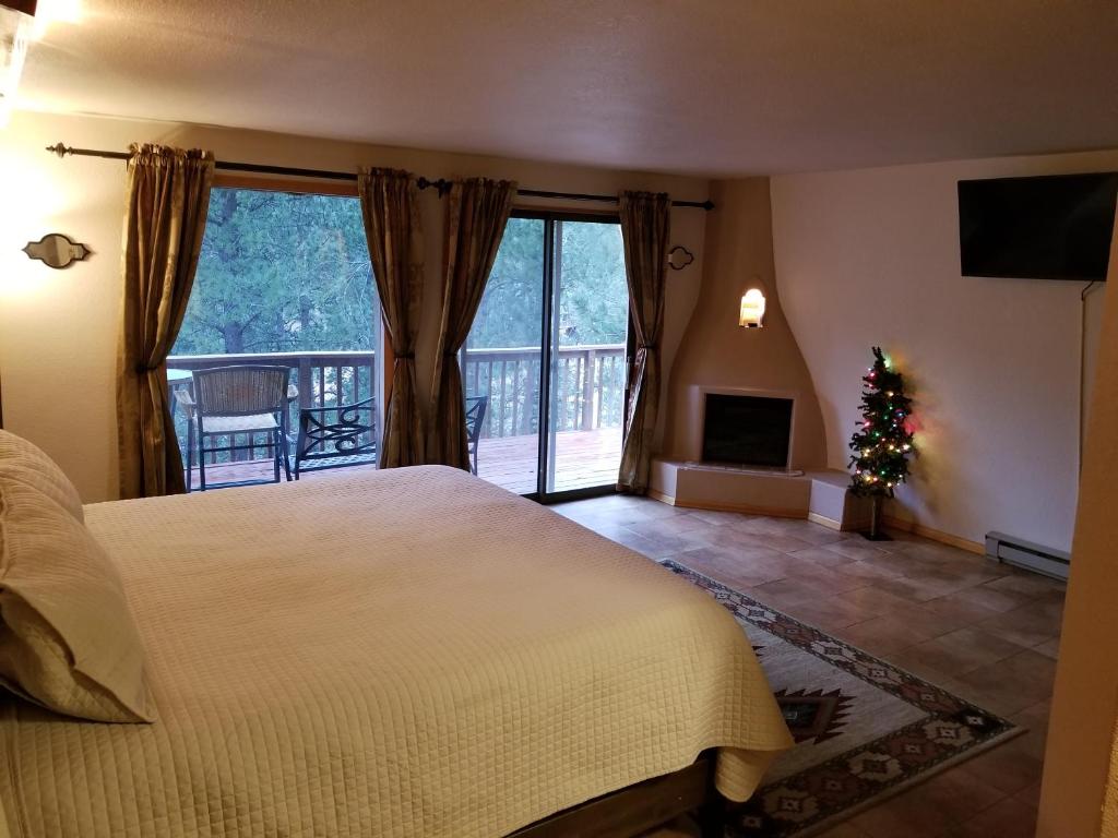 Postel nebo postele na pokoji v ubytování Kokopelli Inn