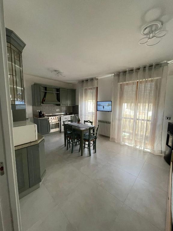 Kuchyň nebo kuchyňský kout v ubytování Appartamento La Tramontana