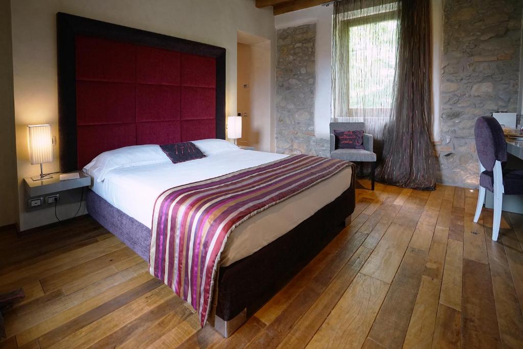 Postel nebo postele na pokoji v ubytování Il Portico - 1711 Luxury Guest House