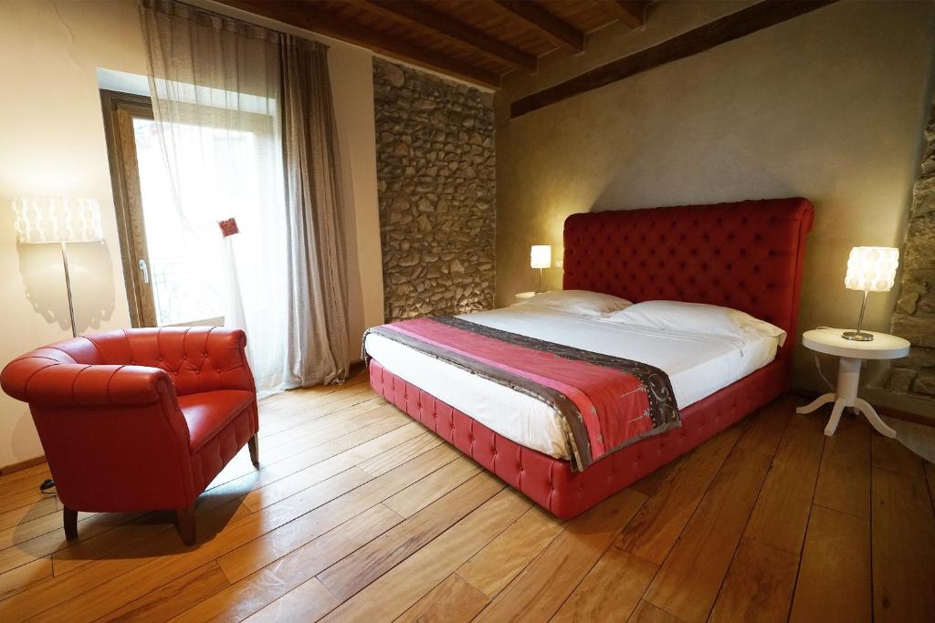 Postel nebo postele na pokoji v ubytování Il Portico - 1711 Luxury Guest House